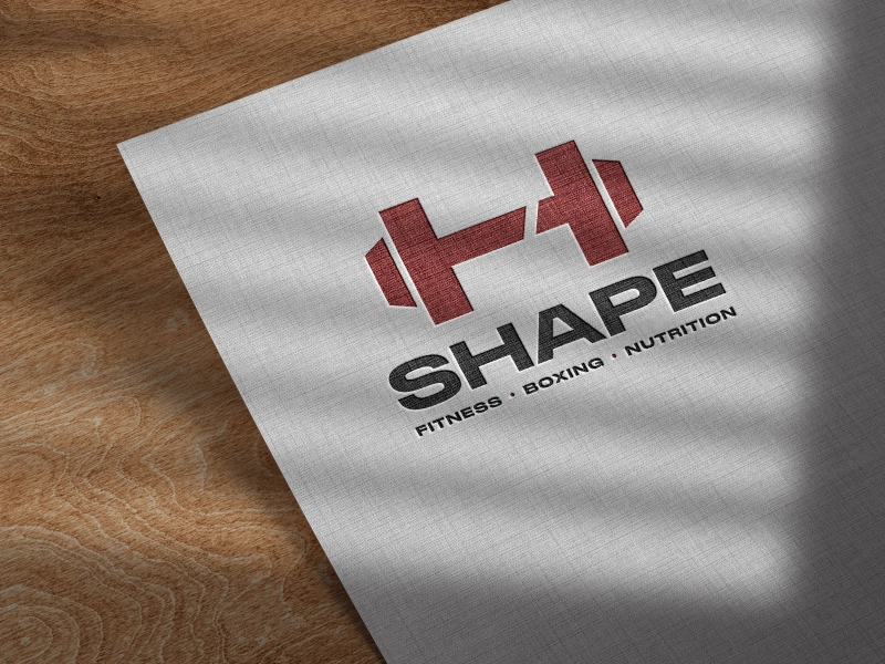 מוקאפ מחברת עם הלוגו של סטודיו שייפ