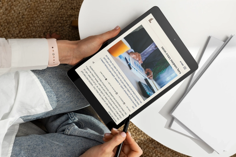 תמונה של אתר לומר פיננסים בטאבלט